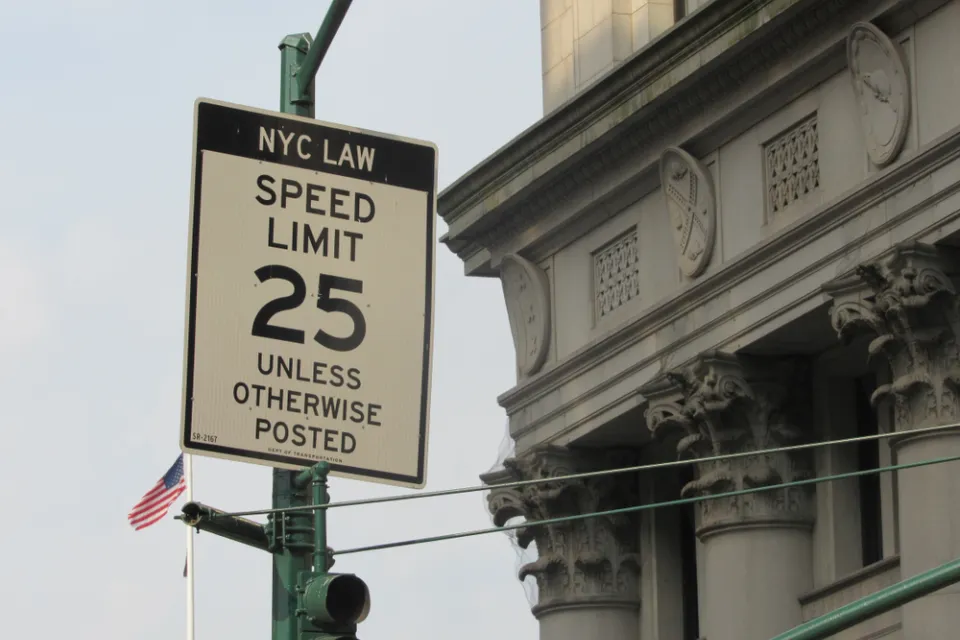 "25mph unless otherwise posted" speed limit sign in New York City